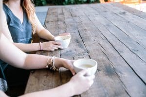 Women sharing tea at a table