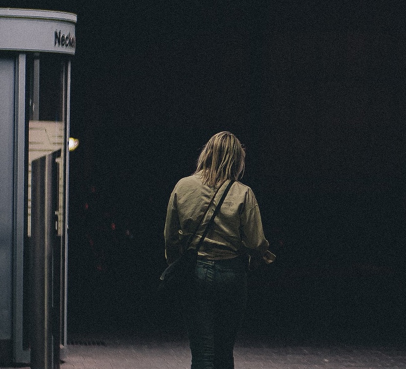 Lone woman outside office building